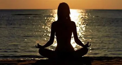 Yoga and meditation session by the lake